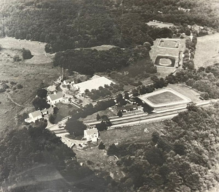 Aerial view of the original North Andover shop and Riding Academy next door