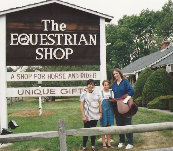 Monique Proulx Pregnant outside th North Andover store location with customers leaving happy with their new saddle.