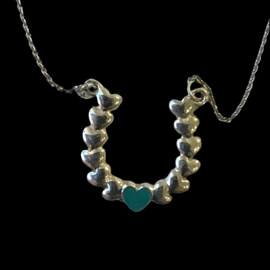 Cascading heart pendant