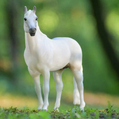 Breyer Snowman Traditional Angled on Blurred colored background