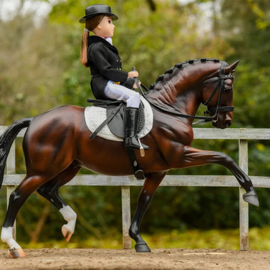 Breyer Traditional Dressage Rider Megan riding model horse with Stoneleigh II Dressage Saddle