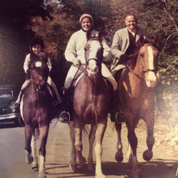 The Proulx family all riding horses. from left to right is Monique, Rosita, and Paul.