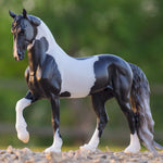 Breyer Traditional Battlefield Angel HP Model horse on Blurred wooded Background