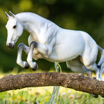 Breyer Traditional Get Rowdy jumping log in woods