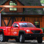Traditional Dually Truck In front of wood barn/house