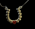 Cascading heart pendant