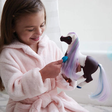 Breyer Marina the Color Changing Mer-Pony being played with in the bathroom by young girl