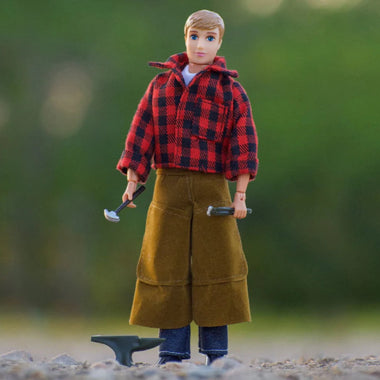 Breyer Traditional Farrier on blurred background