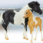 Breyer Traditional The Phantom and Misty Gift Set on blurred beach background
